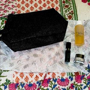 Brand new Revive deluxe skincare travel set